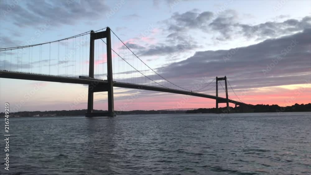 Beautiful sunset with bridge view and calm ocean. Beautiful sunset with bridge view and calm ocean.