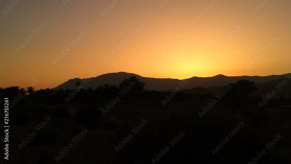 Beautiful orange sky as the sun sets over the mountains of the Mediterranean in Southern Europe. Beautiful orange sky as the sun sets over the mountains of the Mediterranean in Southern Europe.