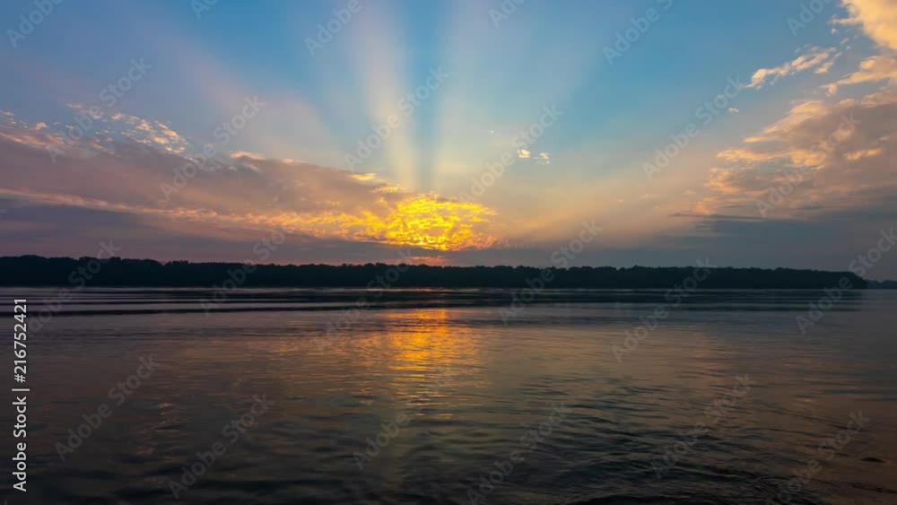 A Time Lapsed sequence of a Sunrise over the Niagara River. This time lapsed footage is 4K and 23.976 frames per second. This was shot only ten minutes away from Niagara Falls. A Time Lapsed sequence of a Sunrise over the Niagara River. This time lapsed footage is 4K and 23.976 frames per second. This was shot only ten minutes away from Niagara Falls.