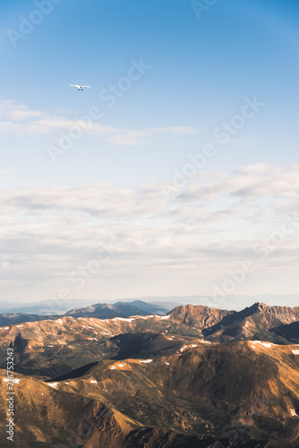 An airplane flying over the Rocky Mountains in Colorado. 