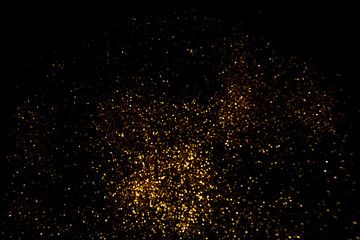 Abstract gold background. Glitter vintage lights background.