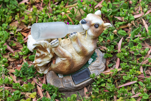 Whimsical Garden Art Decoration - Squirrel Holding a Bottle