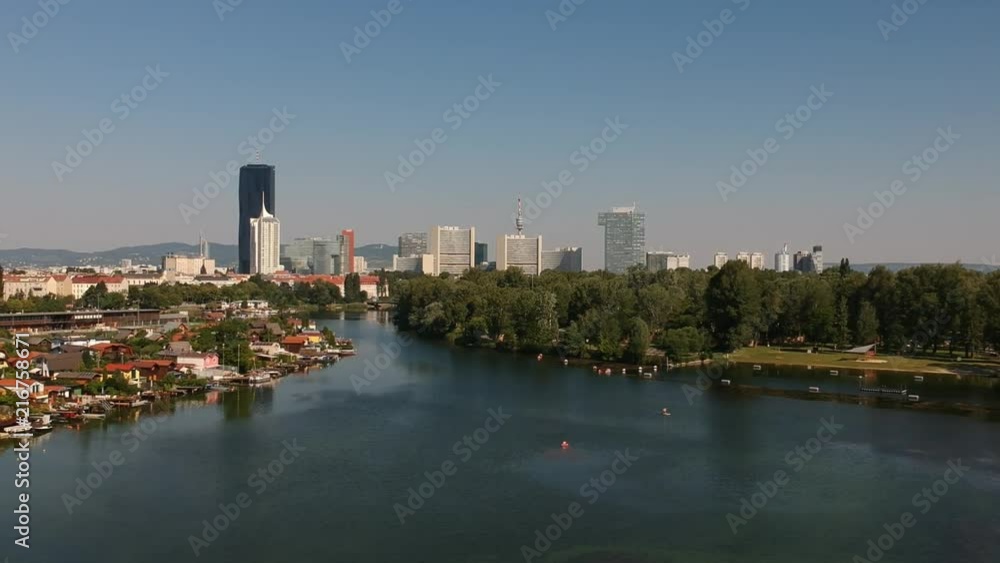 Drone flight over Alte Donau viewing Donaucity in Vienna, Austria Drone flight over Alte Donau viewing Donaucity in Vienna, Austria