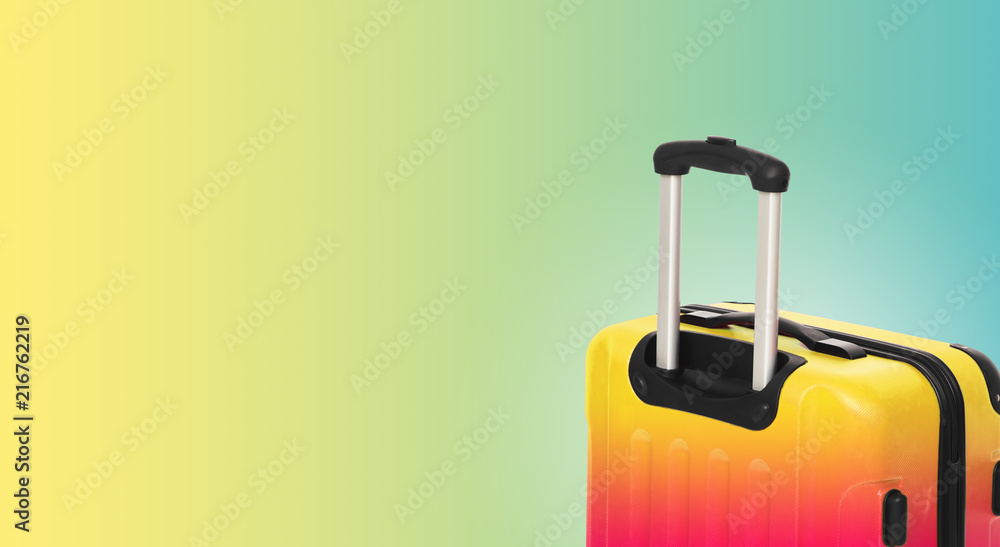 Fototapeta premium Colorful horizontal banner with suitcase and copyspace. Travelling concept.