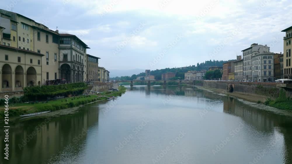 Florence, Italy-July 26, 2018: View of Ponte alle Grazie from Ponte Vecchio Florence, Italy-July 26, 2018: View of Ponte alle Grazie from Ponte Vecchio