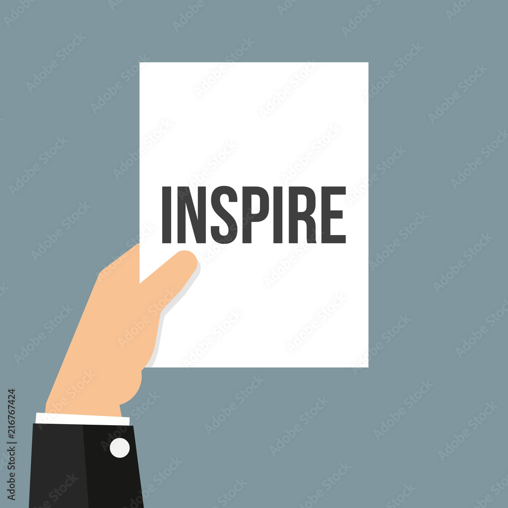 Man showing paper INSPIRE text Man showing paper INSPIRE text