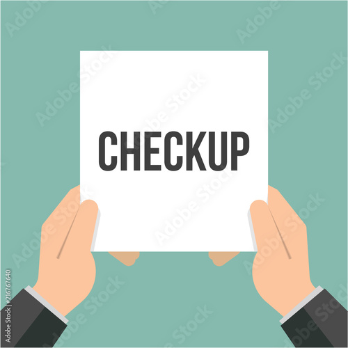 Man showing paper CHECKUP text