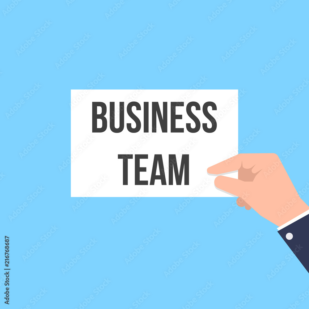 Man showing paper BUSINESS TEAM text Man showing paper BUSINESS TEAM text