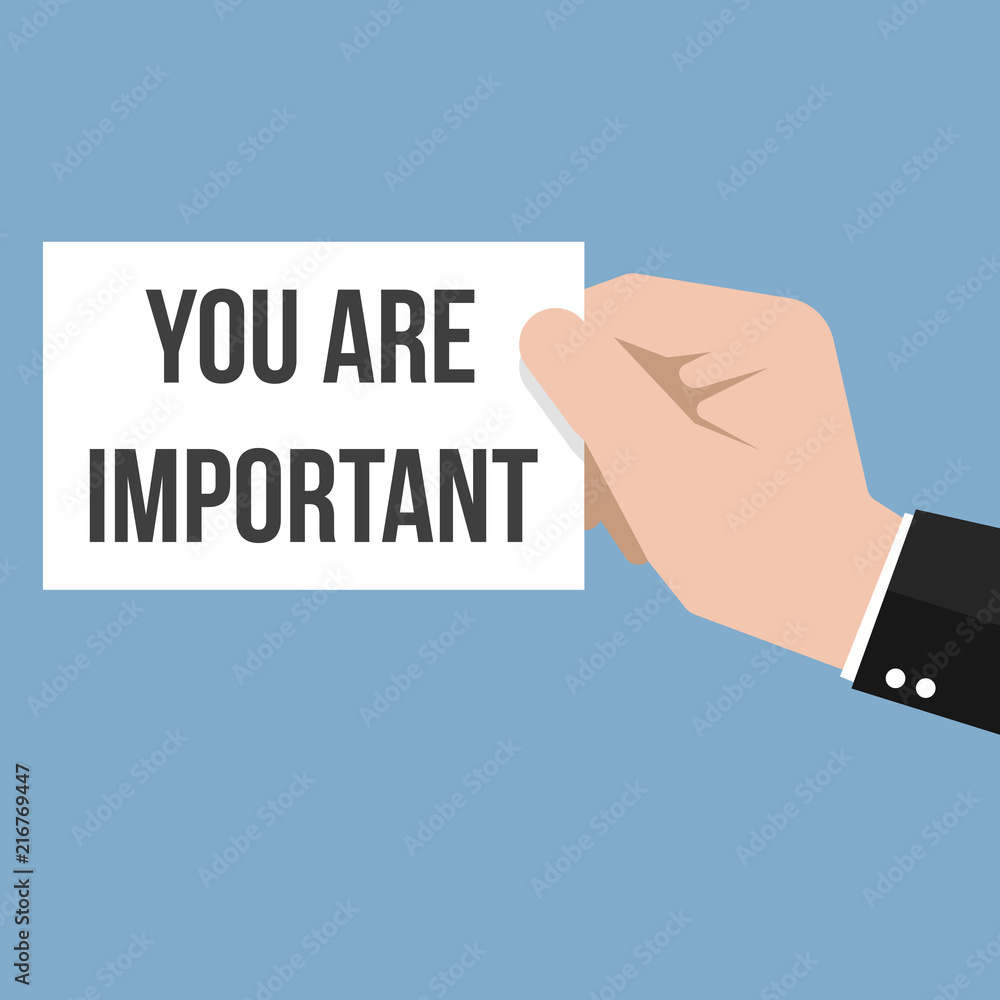 Man showing paper YOU ARE IMPORTANT text Man showing paper YOU ARE IMPORTANT text