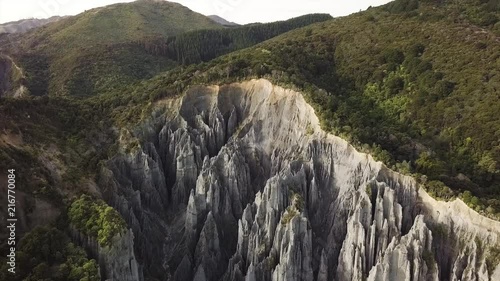 Aerial flyover of the Putangirua Pinnacles, new zealand popular hiking and film location. photo