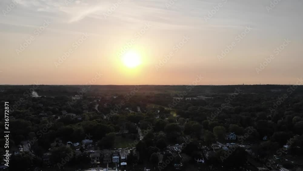 Slow rise up over a small town in western Wisconsin as the sun is setting. Slow rise up over a small town in western Wisconsin as the sun is setting.