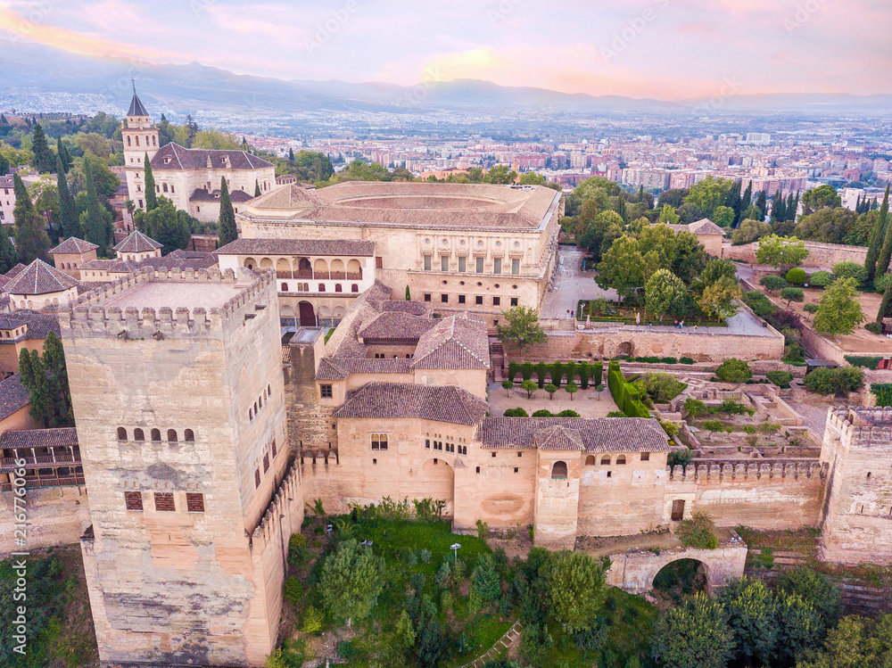 Alhambra. palace and fortress complex located in Granada, Andalusia, Spain. Sunrise. Aerial photo from drone. top view