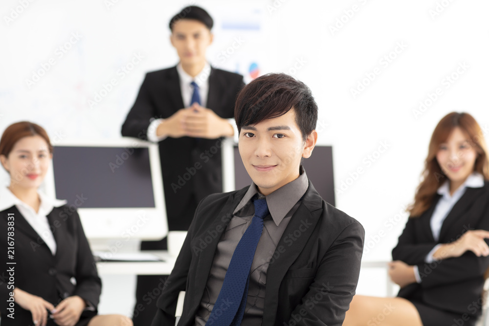 Portrait of successful young business team in office Portrait of successful young business team in office