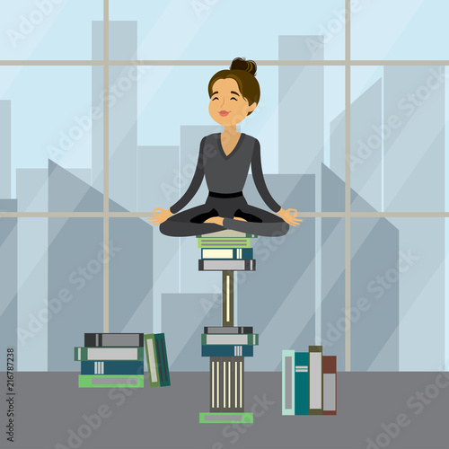 Businesswoman relax in lotus yoga pose sitting on a pile of books