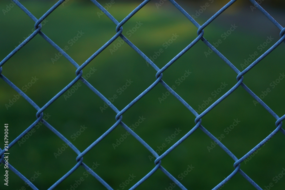 Close up view of chain link fence pattern Close up view of chain link fence pattern