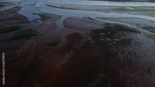 PANNING DOWN aerial view of the river in Lympstone in Devon photo