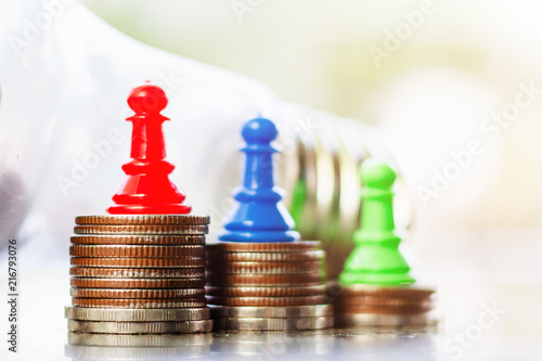 Chess pawn on the top of co...