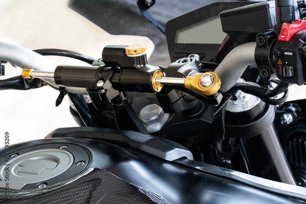 Motorcycle steering damper. A damper helps keep the bike tracking straight  over difficult terrain such as