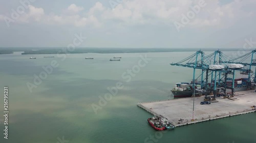 Cargo ships on dock at Northport, Klang, Malaysia. Northport is one of the largest and important ports of Malaysia. photo