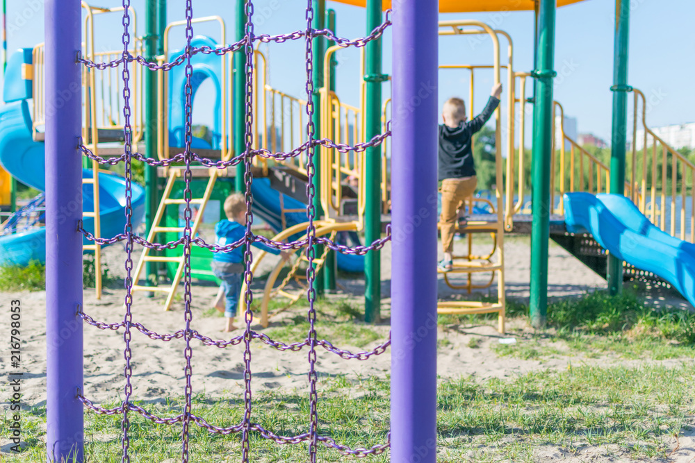 Fototapeta premium Playground with children playing in summer.