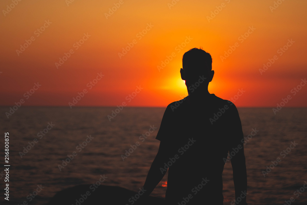 portrait silhouette of a men in the sunset