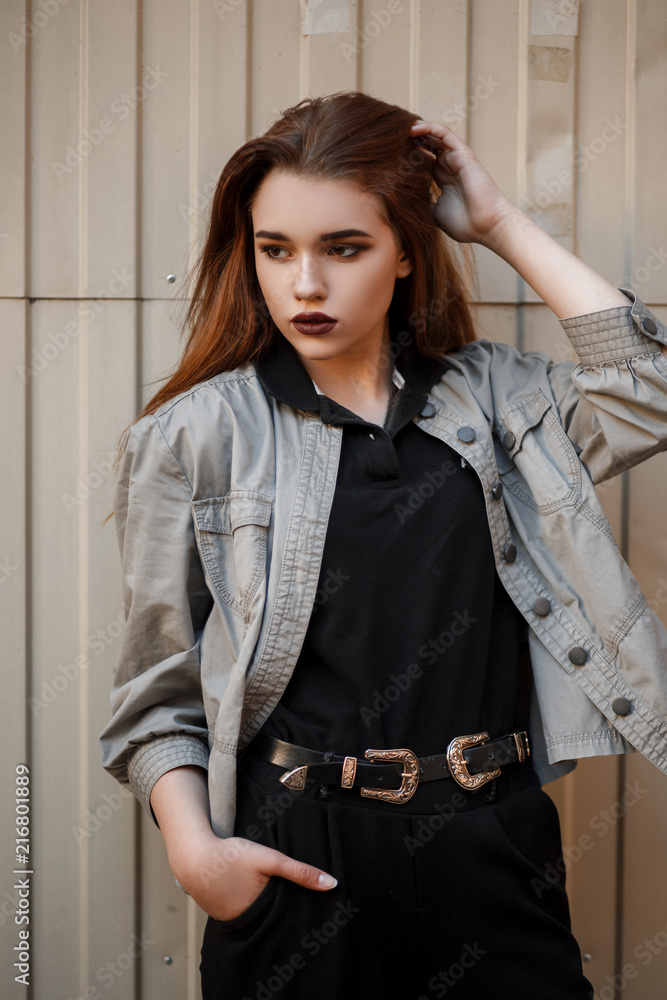 Sensual Female Model Posing in Denim Jacket, Jeans and White Socks on the  Floor near Beige Wall. Back to 1990s Fashion Lifestyle Style Concept. Stock  Photo | Adobe Stock