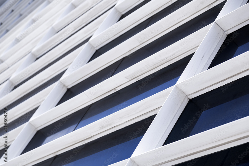 Building exterior detail, pattern of windows Building exterior detail, pattern of windows