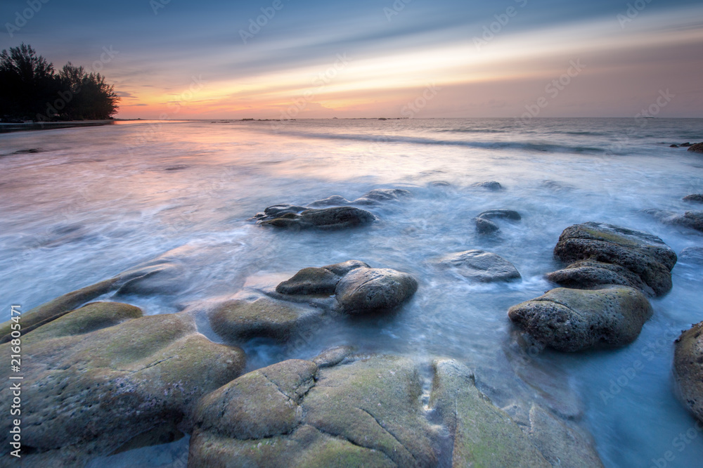Fototapeta premium Long expose seascape during Blue Hour at Kudat, Malaysia. soft focus due to long expose.