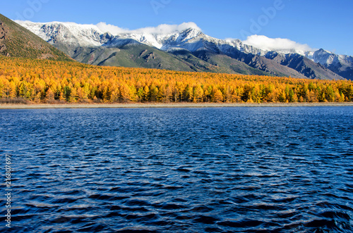 Lake and mountains of Siberia with reflection
