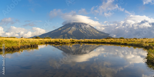 Reflection of Mount Taranaki. Egmont National Park, New Plymouth district, Taranaki region, North Island, New Zealand.