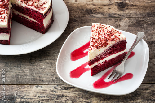 Red Velvet cake slice on wooden table