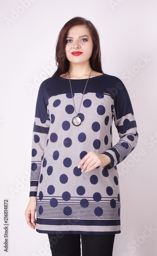 Fotografie beautiful woman in tights and a tunic . plus size.