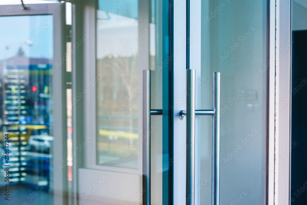 Close-up of Aluminum glass door handle. Close-up of Aluminum glass door handle.