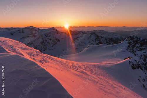 Sunrise from the summit of San Matteo Peak. Santa Caterina Valfurva, Sondrio district, Lombardy, Italy photo