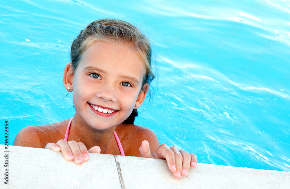 Cute smiling happy little girl child in swimming pool Stock Photo ...