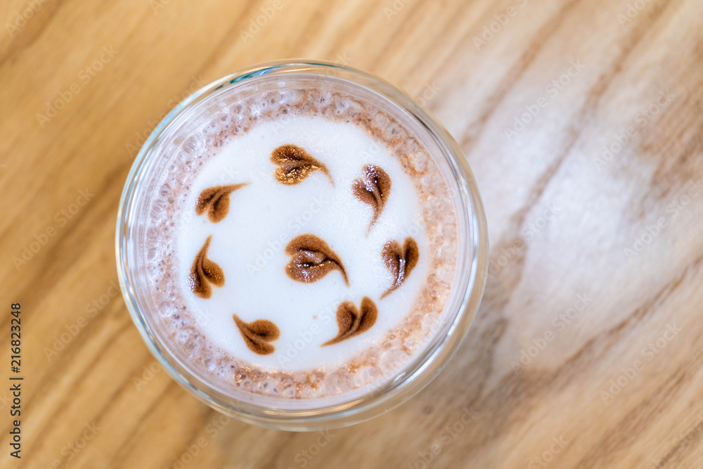 A glass of chocolate with mini heart shape A glass of chocolate with mini heart shape