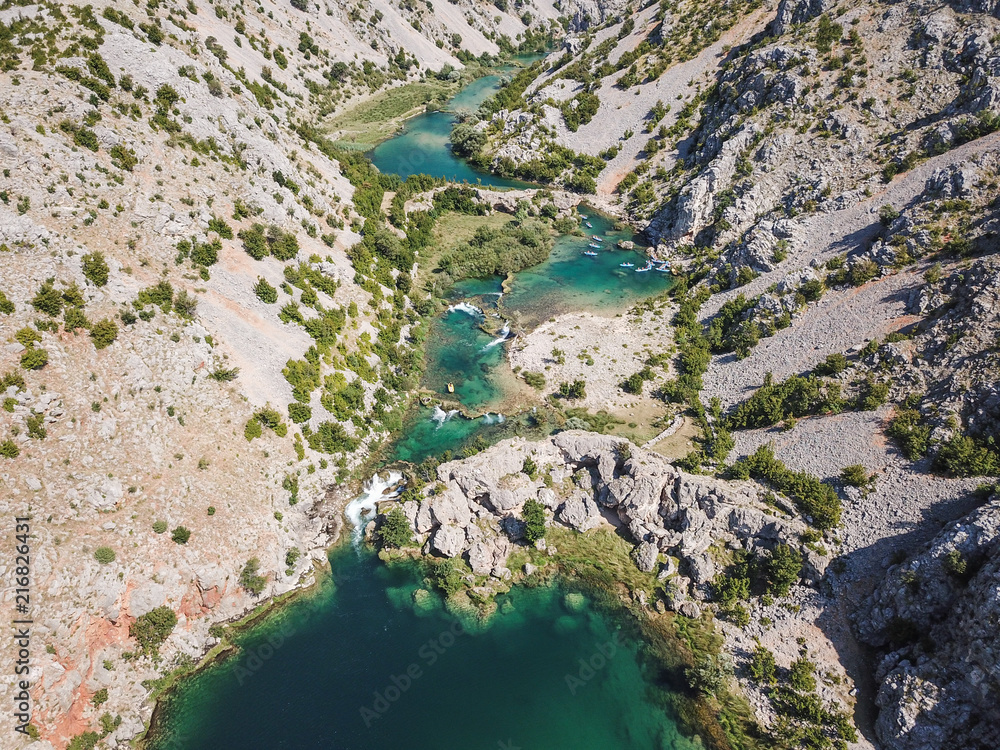 Zrmanja River in northern Dalmatia, Croatia is famous for its crystal clear waters and countless waterfalls surrounded by a deep canyon.