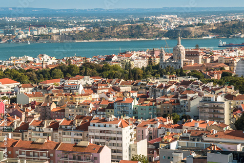 Panoramic view of Lisbon colorful rooftop from Amoreiras viewpoint towards River Tagus