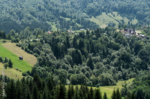 Mountain landscape and villages on the Rucar Bran corridor, in Transylvania, Romania © adellyne