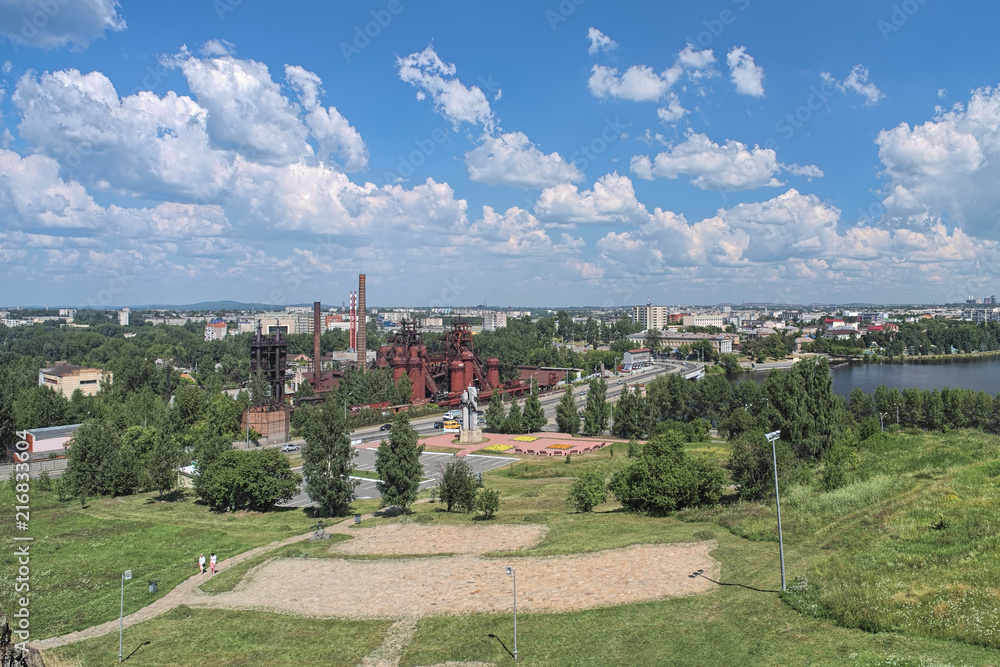 View of Nizhny Tagil from the slope of Lisya Hill, Russia. On the foreground is visible the former steel plant founded by the Russian industrialist Akinfiy Demidov in 1725.