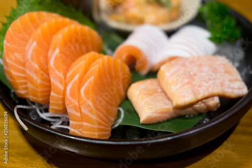 Raw salmon slice or salmon sashimi