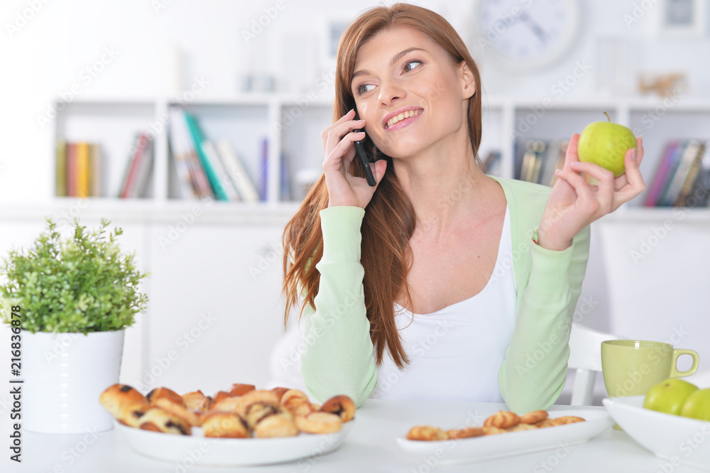 Beautiful young woman talking on mobile phone Beautiful young woman talking on mobile phone