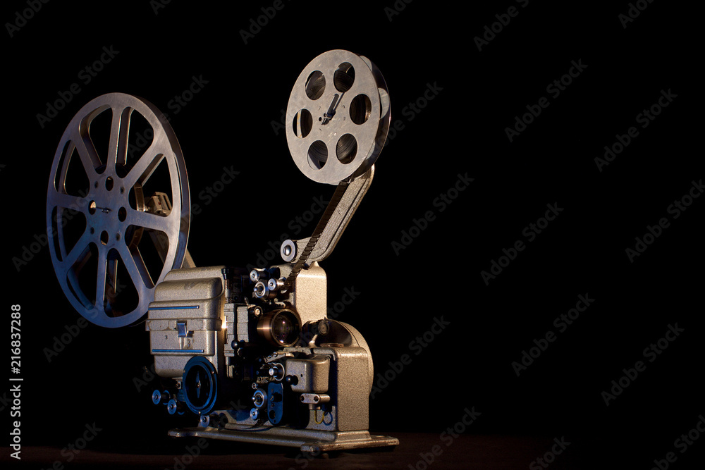 Obraz premium movie projector on black background