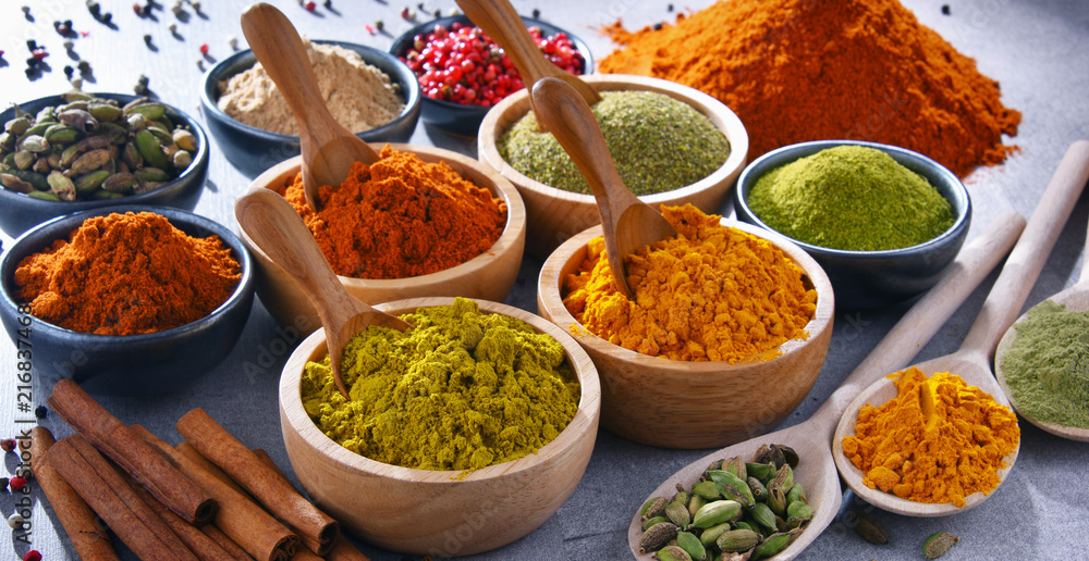 Fototapeta premium Variety of spices on kitchen table