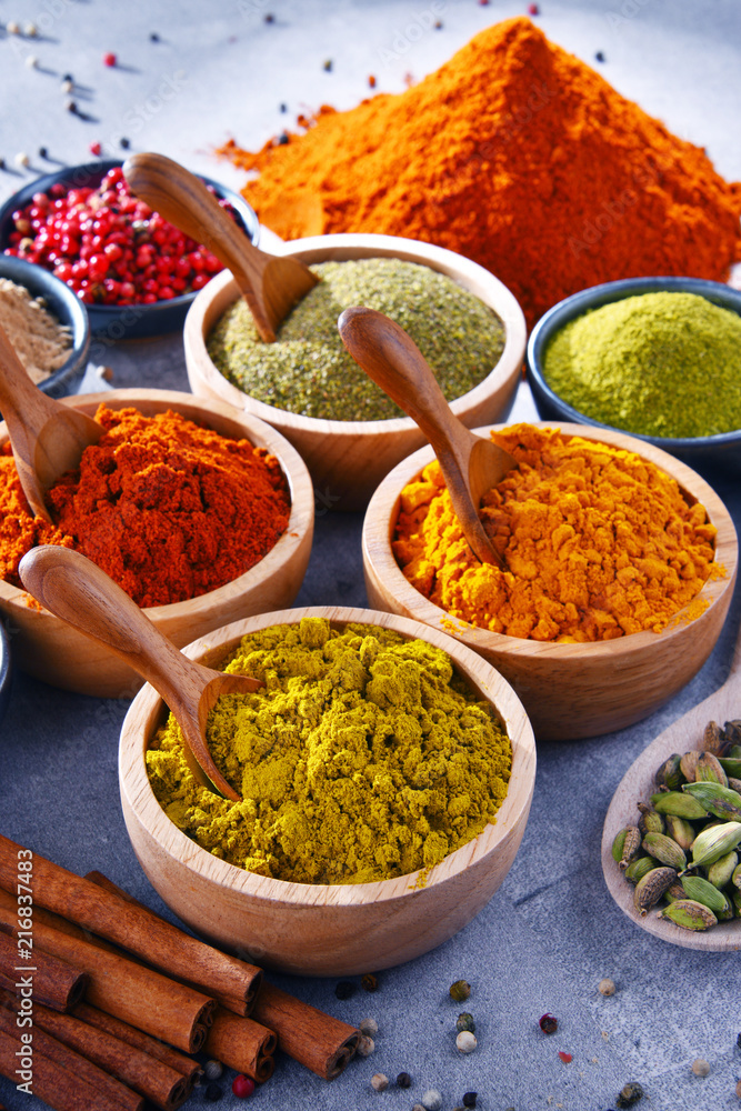 Variety of spices on kitchen table Variety of spices on kitchen table