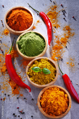 Fototapeta Naklejka Na Ścianę i Meble -  Variety of spices on kitchen table