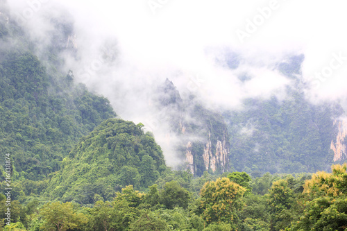 Landscape view from pha ngeun view point and mountain in the fog background at vang vieng, Laos © Monthira