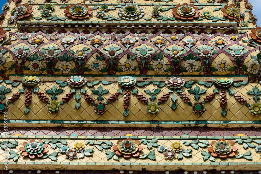 Close up beauitful mosaic tiles of large stupas in Wat Pho or Wat Phra Chetuphon Vimolmangklararm Rajwaramahaviharn is one of Bangkok's oldest temples, THAILAND Close up beauitful mosaic tiles of large stupas in Wat Pho or Wat Phra Chetuphon Vimolmangklararm Rajwaramahaviharn is one of Bangkok's oldest temples, THAILAND
