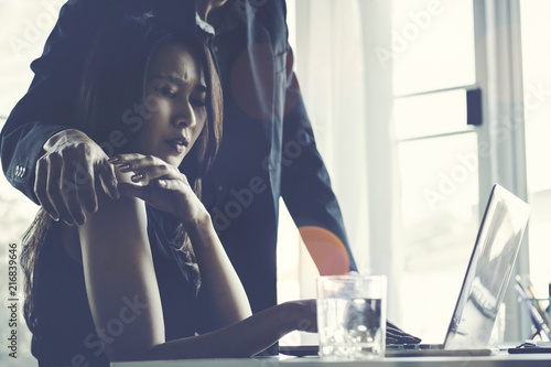 Billede på lærred Sexual harassment concept, businessman making sexual threatening by touching and