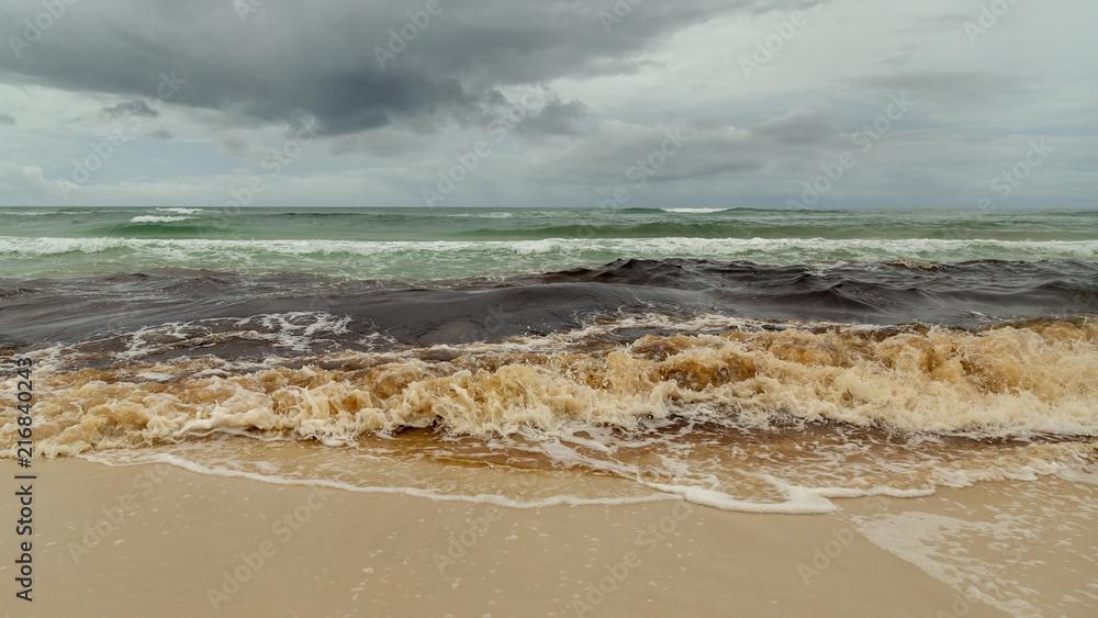 Stormy sea waves crashing on Florida beach